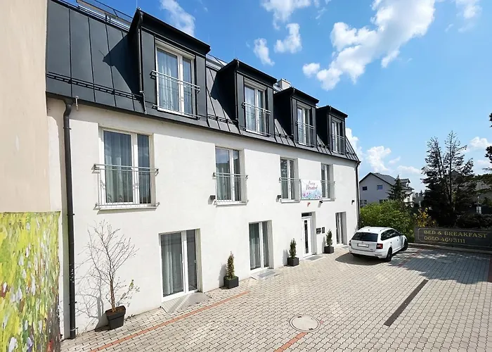 Pension Voesendorf Maison d'hôtes 4*